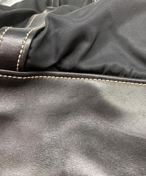PRADA（プラダ）PRADA (プラダ) ナイロンレザーコンビハンドバッグ ブラックの古着・服飾アイテム