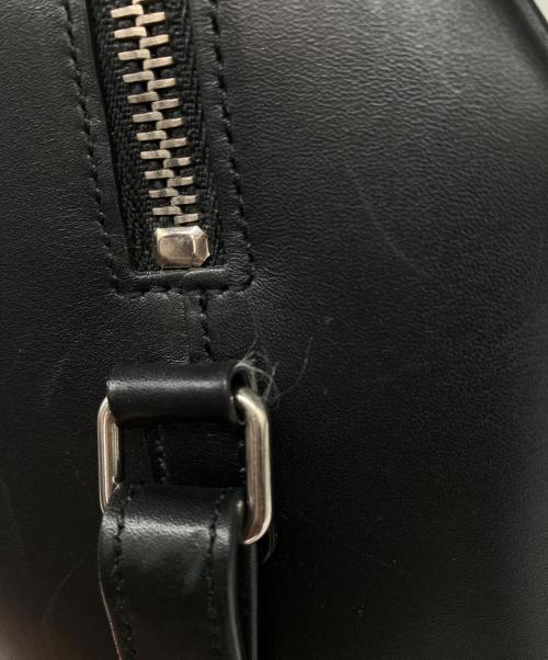 Saint Laurent Paris（サンローランパリ）Saint Laurent Paris (サンローランパリ) ベイビーダッフル スタッズバッグ ブラックの古着・服飾アイテム