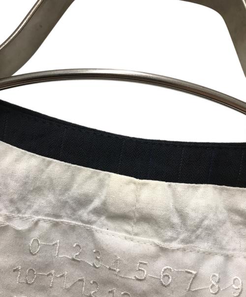 Maison Margiela（メゾンマルジェラ）Maison Margiela (メゾンマルジェラ) H&M (エイチアンドエム) ペンキデザインベスト ホワイト×ブラック サイズ:52の古着・服飾アイテム