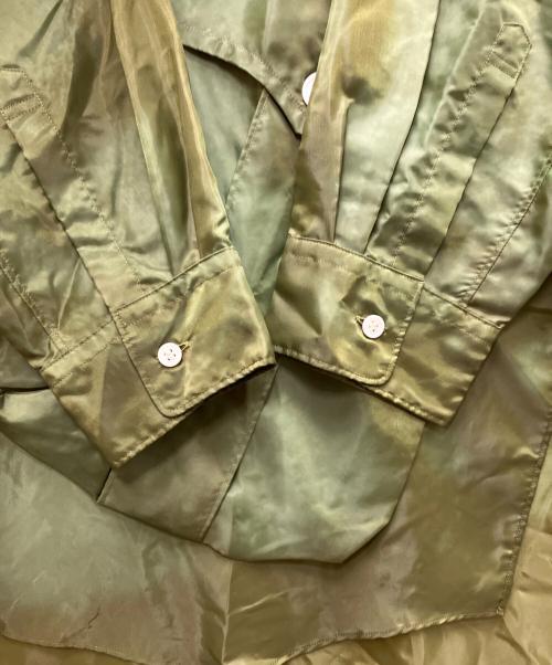 COMME des GARCONS HOMME PLUS（コムデギャルソンオムプリュス）COMME des GARCONS HOMME PLUS (コムデギャルソンオムプリュス) 25AW アシンメトリー捻じれポリシャツ グリーン サイズ:Lの古着・服飾アイテム