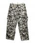 ERL（イーアールエル）の古着「SKULL CARGO PANTS」｜ホワイト