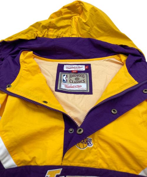 MITCHELL & NESS（ミッチェルアンドネス）MITCHELL & NESS (ミッチェルアンドネス) アノラックパーカー / レイカーズ / Lakers イエロー×パープル サイズ:XLの古着・服飾アイテム