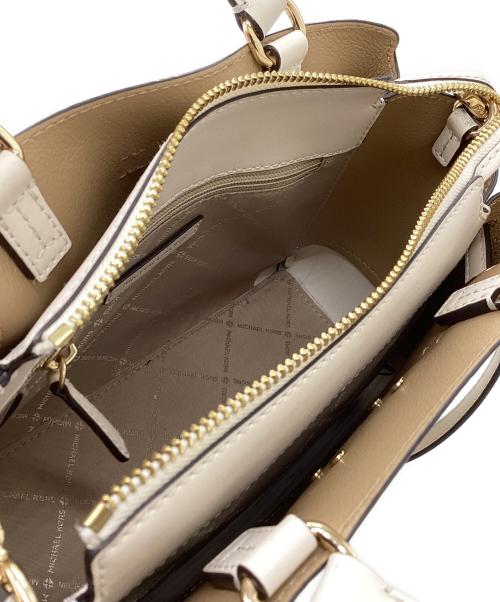 MICHAEL KORS（マイケル・コース）MICHAEL KORS (マイケル・コース) REED SM CZ BELTED STCHL LEAHTER / ベルト付きスティッチレザー / 35S3G6RS1T アイボリーの古着・服飾アイテム