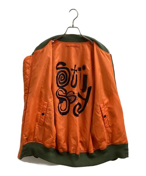 stussy（ステューシー）stussy (ステューシー) リバーシブルMA-1ジャケット カーキ×オレンジ サイズ:Mの古着・服飾アイテム