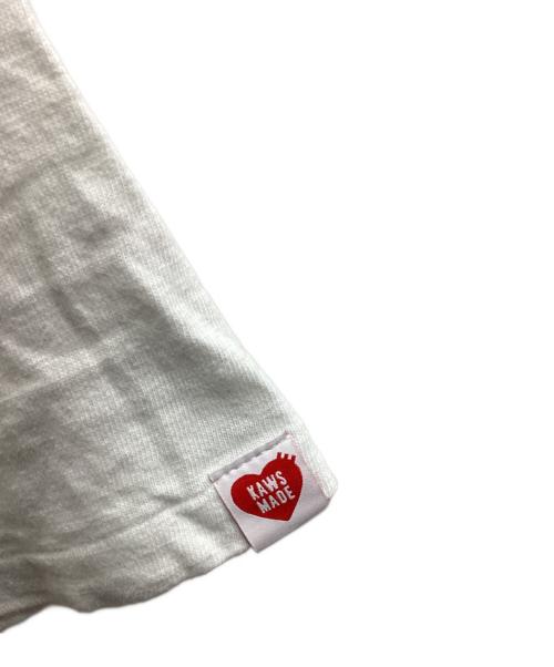 HUMAN MADE（ヒューマンメイド）HUMAN MADE (ヒューマンメイド) KAWS (カウズ) GRAPHIC TEE / グラフィックティー ホワイト サイズ:Mの古着・服飾アイテム