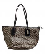 COACHコーチ）の古着「コーテッドキャンバス タクシージップトートバッグ / 33504 / シグネチャー」｜ブラウン