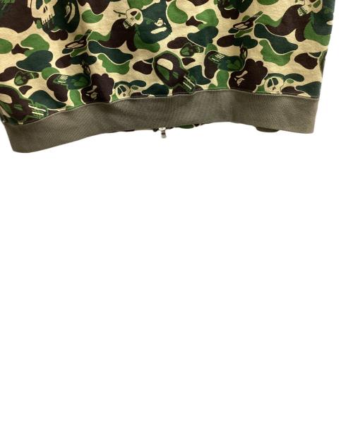 A BATHING APE（ア ベイシング エイプ）A BATHING APE (アベイシングエイプ) stussy (ステューシー) スカルサルカモジップパーカー / 30周年記念 / 10AW グリーン サイズ:Lの古着・服飾アイテム