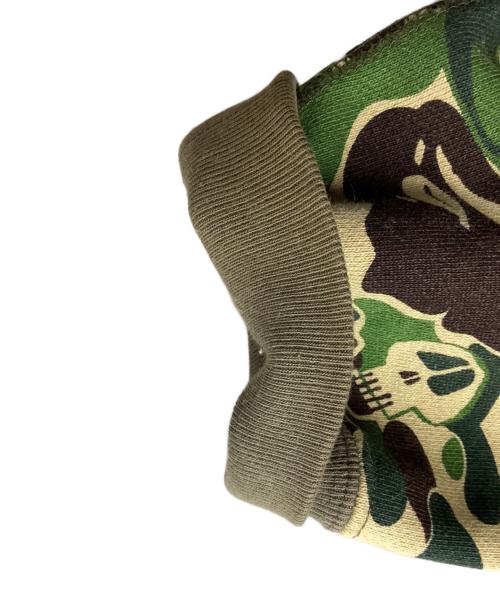 A BATHING APE（ア ベイシング エイプ）A BATHING APE (アベイシングエイプ) stussy (ステューシー) スカルサルカモジップパーカー / 30周年記念 / 10AW グリーン サイズ:Lの古着・服飾アイテム