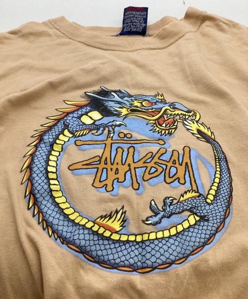 stussy（ステューシー）stussy (ステューシー) ドラゴンTシャツ ベージュ サイズ:Lの古着・服飾アイテム