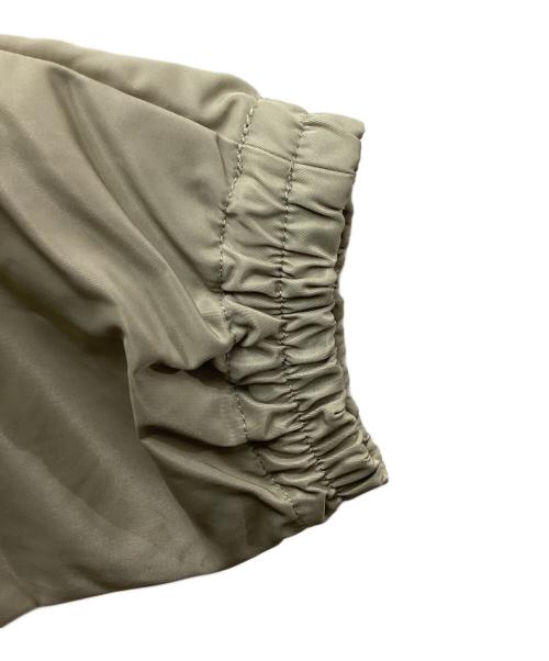 Onitsuka Tiger（オニツカタイガー）Onitsuka Tiger (オニツカタイガー) PADDED COACH JACKET　/　2183B240 ベージュ サイズ:Lの古着・服飾アイテム