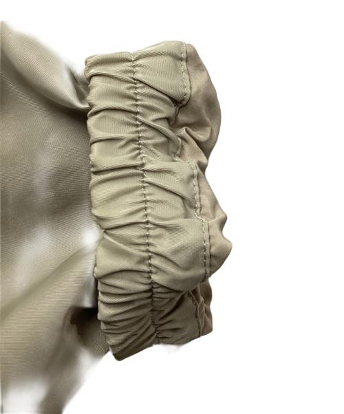 Onitsuka Tiger（オニツカタイガー）Onitsuka Tiger (オニツカタイガー) PADDED COACH JACKET　/　2183B240 ベージュ サイズ:Lの古着・服飾アイテム