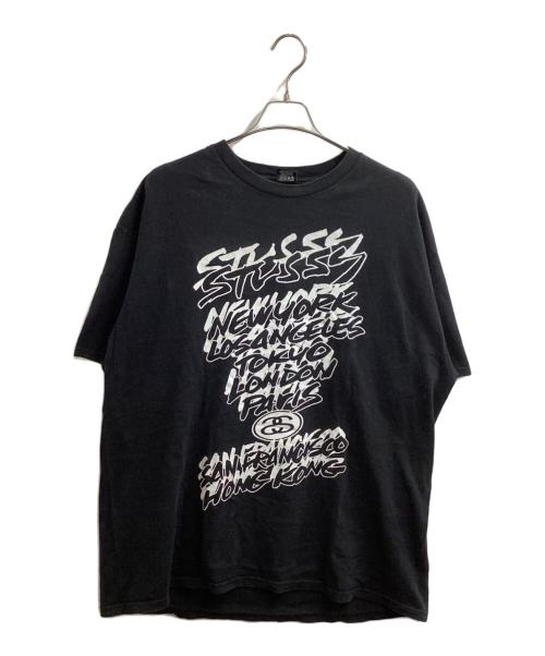 stussy（ステューシー）stussy  (ステューシー) WORLD TOUR TEE / ワールドツアーＴシャツ /  JIM PHILLIPS ブラック サイズ:XLの古着・服飾アイテム