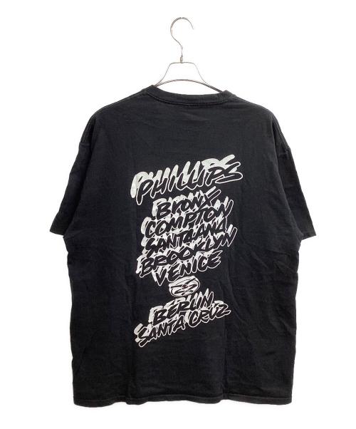 stussy（ステューシー）stussy  (ステューシー) WORLD TOUR TEE / ワールドツアーＴシャツ /  JIM PHILLIPS ブラック サイズ:XLの古着・服飾アイテム