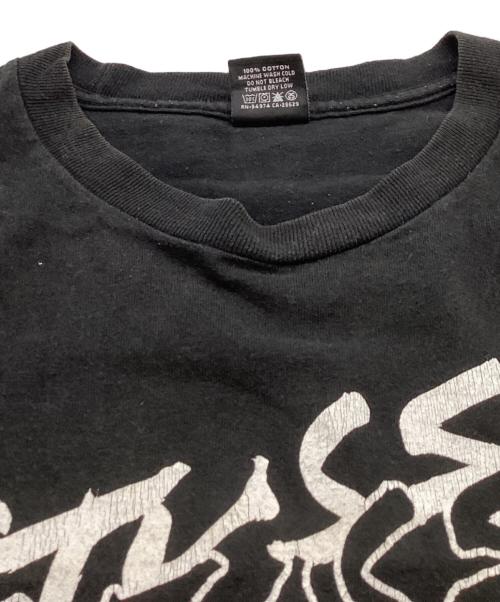 stussy（ステューシー）stussy  (ステューシー) WORLD TOUR TEE / ワールドツアーＴシャツ /  JIM PHILLIPS ブラック サイズ:XLの古着・服飾アイテム