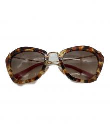 MIU MIU（ミュウミュウ）の古着「サングラス SUNGLASSES / SMU10N UBR-3D0」｜ブラウン