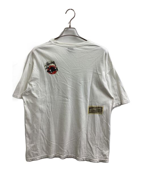 stussy（ステューシー）stussy (ステューシー) SURFMAN FOR JAH IRIE TEE ホワイト サイズ:Lの古着・服飾アイテム