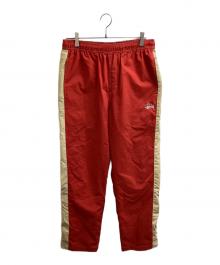 stussy（ステューシー）の古着「Panel Track Relaxed Pant / 116491」｜レッド