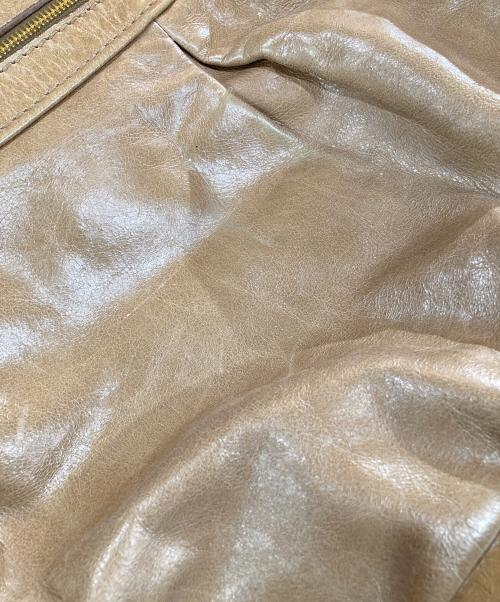 MIU MIU（ミュウミュウ）MIU MIU (ミュウミュウ) ハートチャーム付き 2WAYバック ブラウンの古着・服飾アイテム