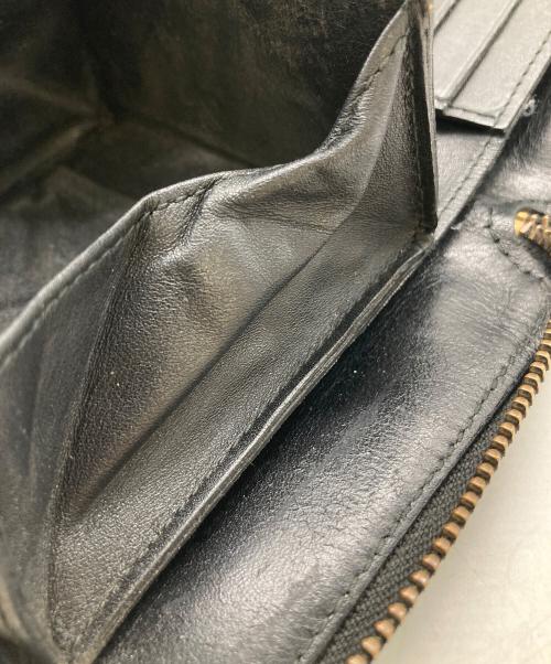 COMME des GARCONS（コムデギャルソン）COMME des GARCONS (コムデギャルソン) クローバー型 ラウンドジップウォレット  ブラックの古着・服飾アイテム