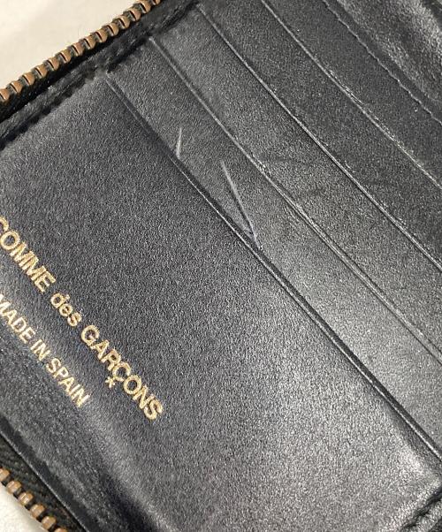 COMME des GARCONS（コムデギャルソン）COMME des GARCONS (コムデギャルソン) クローバー型 ラウンドジップウォレット  ブラックの古着・服飾アイテム