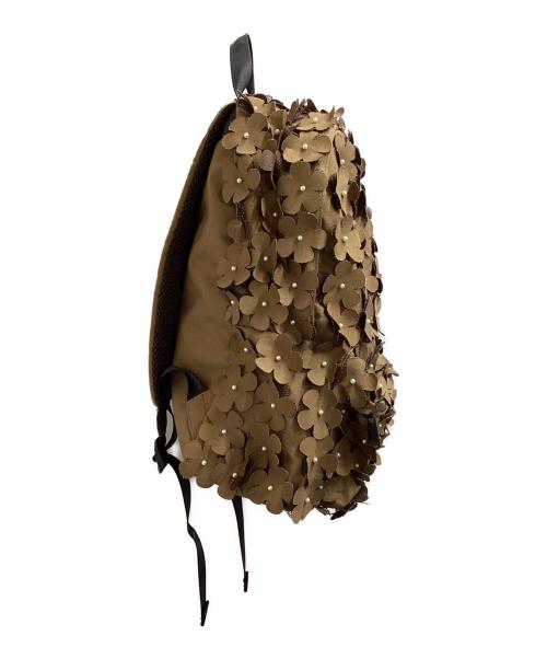 OUTDOOR PRODUCTS（アウトドア プロダクツ）OUTDOOR PRODUCTS (アウトドア プロダクツ) MUVEIL (ミュベール) 21SS / フラワーモチーフ コラボリュック ブラウンの古着・服飾アイテム