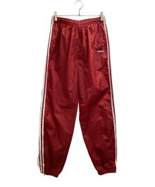 adidas（アディダス）の古着「ナイロントラックパンツ」｜レッド