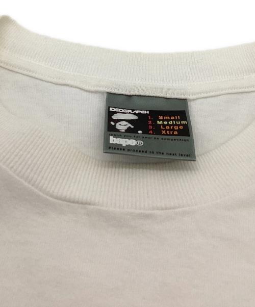 A BATHING APE（アベイシングエイプ）A BATHING APE (アベイシングエイプ) 2002 HAJIME SORAYAMA プリントTシャツ / 空山基 ホワイト サイズ:Mの古着・服飾アイテム