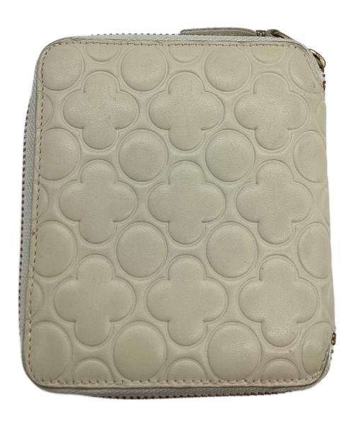 COMME des GARCONS（コムデギャルソン）COMME des GARCONS (コムデギャルソン) フラワー型押しラウンドジップウォレット アイボリーの古着・服飾アイテム