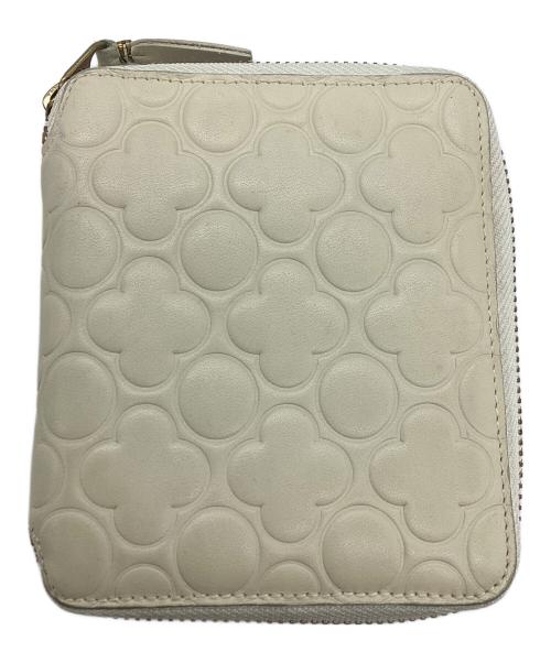 COMME des GARCONS（コムデギャルソン）COMME des GARCONS (コムデギャルソン) フラワー型押しラウンドジップウォレット アイボリーの古着・服飾アイテム