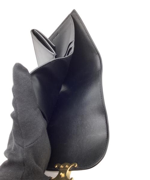 CELINE（セリーヌ）CELINE (セリーヌ) トリオンフ スモール フラップウォレット ブラックの古着・服飾アイテム