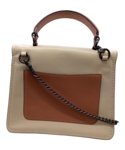 COACH（コーチ）COACH (コーチ) パーカー トップ ハンドル ウィズ バタフライ ターンロック　/　69605 ピンク×アイボリーの古着・服飾アイテム