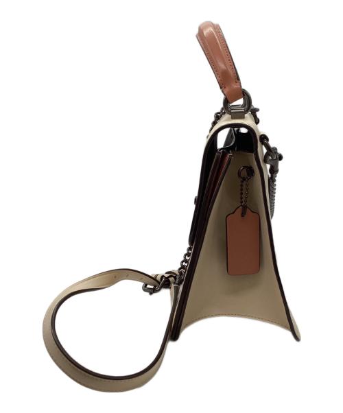 COACH（コーチ）COACH (コーチ) パーカー トップ ハンドル ウィズ バタフライ ターンロック　/　69605 ピンク×アイボリーの古着・服飾アイテム