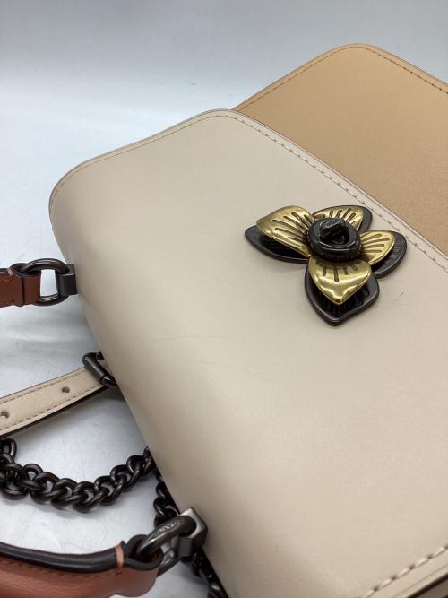 COACH（コーチ）COACH (コーチ) パーカー トップ ハンドル ウィズ バタフライ ターンロック　/　69605 ピンク×アイボリーの古着・服飾アイテム