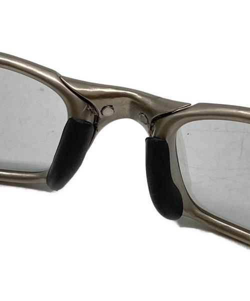 OAKLEY（オークリー）OAKLEY (オークリー) サングラス シルバーの古着・服飾アイテム
