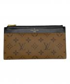 LOUIS VUITTONルイ ヴィトン）の古着「M80390 モノグラム・リバース スリム パース」｜ブラウン