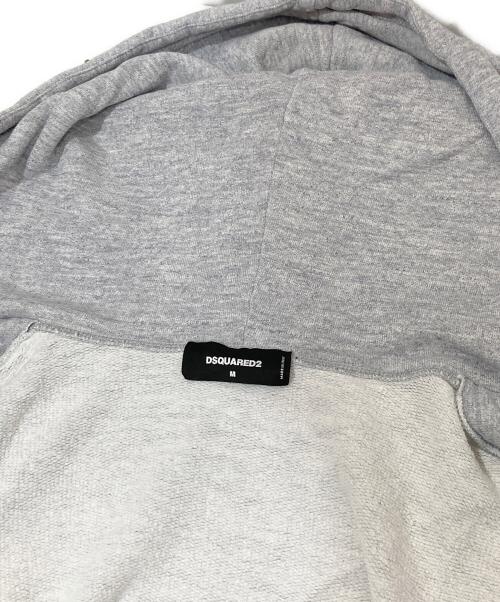 DSQUARED2（ディースクエアード）DSQUARED2 (ディースクエアード) スタッズ付きペイントダメージ加工ジップアップパーカー グレー サイズ:Mの古着・服飾アイテム