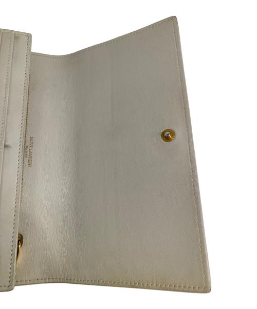 Yves Saint Laurent（イヴサンローラン）Yves Saint Laurent (イヴサンローラン) カサンドラYSLラージフラップウォレット アイボリーの古着・服飾アイテム