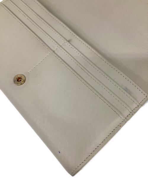 Yves Saint Laurent（イヴサンローラン）Yves Saint Laurent (イヴサンローラン) カサンドラYSLラージフラップウォレット アイボリーの古着・服飾アイテム