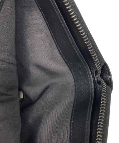 JIMMY CHOO（ジミーチュウ）JIMMY CHOO (ジミーチュウ) エンボスドスターファブリッククラウンドジップウォレット ブラックの古着・服飾アイテム