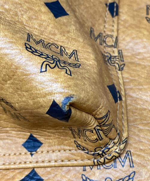 MCM（エムシーエム）MCM (エムシーエム) スタッズリュック ブラウンの古着・服飾アイテム