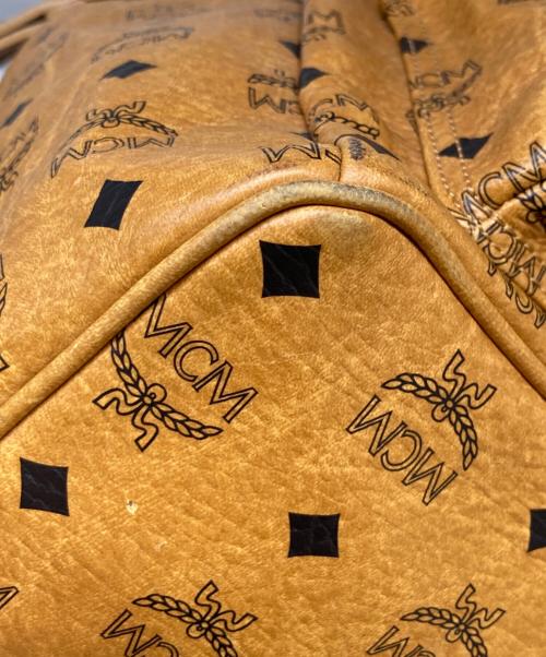 MCM（エムシーエム）MCM (エムシーエム) スタッズリュック ブラウンの古着・服飾アイテム