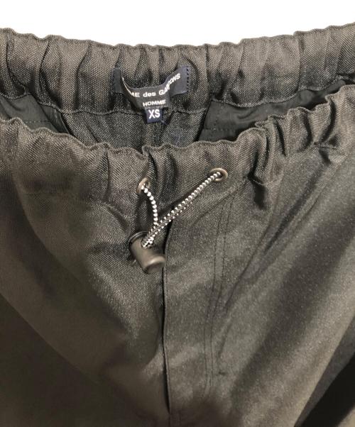 COMME des GARCONS HOMME（コムデギャルソン オム）COMME des GARCONS HOMME (コムデギャルソン オム) Parachute pants エステルマットクロスパラシュートパンツ　ナイロンパンツ　ドローコード　AD23 HL-P005 ブラック サイズ:XSの古着・服飾アイテム