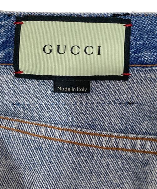 GUCCI（グッチ）GUCCI (グッチ) グッチ レ ポム GG ジーンズ　パッチデザインデニムパンツ　502802 インディゴ サイズ:SIZE 22の古着・服飾アイテム