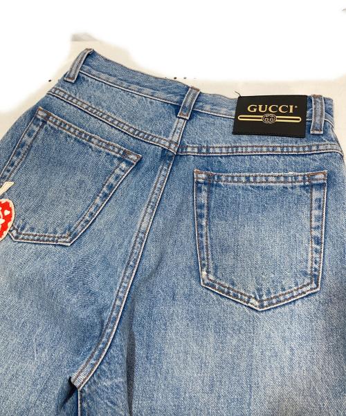 GUCCI（グッチ）GUCCI (グッチ) グッチ レ ポム GG ジーンズ　パッチデザインデニムパンツ　502802 インディゴ サイズ:SIZE 22の古着・服飾アイテム