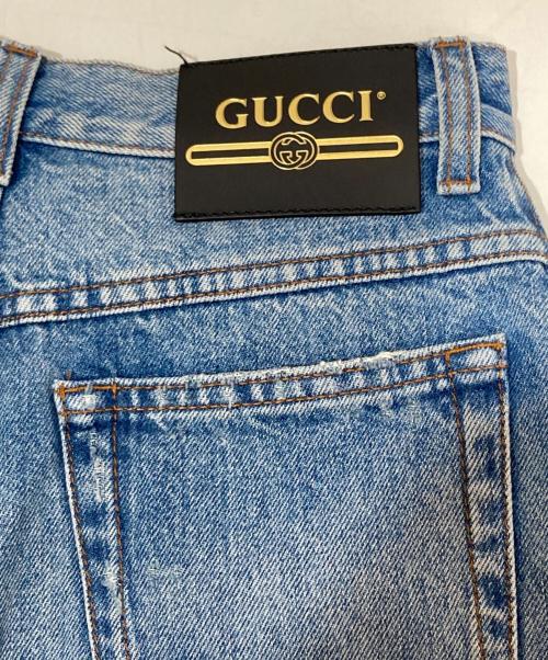 GUCCI（グッチ）GUCCI (グッチ) グッチ レ ポム GG ジーンズ　パッチデザインデニムパンツ　502802 インディゴ サイズ:SIZE 22の古着・服飾アイテム