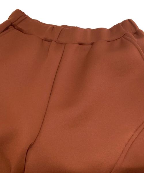 UN3D.（アンスリード）UN3D. (アンスリード) SLIDE CUT FLARE PT / スライドカットフレアパンツ　522340701501-01 オレンジ サイズ:36の古着・服飾アイテム