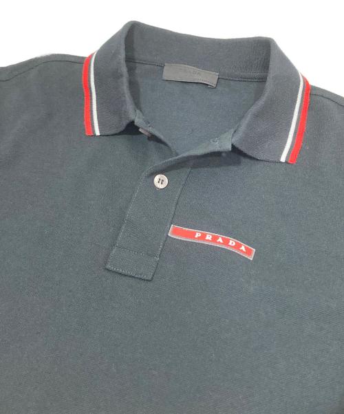 PRADA（プラダ）PRADA (プラダ) ラバーロゴポロシャツ SJJ887　半袖ポロシャツ ブラック サイズ:Mの古着・服飾アイテム