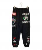 SAINT MICHAELセントマイケル）の古着「コラージュ グラフィック スウェットパンツ」｜ブラック
