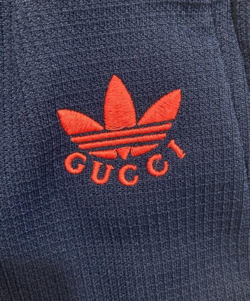 GUCCI（グッチ）GUCCI (グッチ) adidas (アディダス) ロゴ刺繍 イージートラックパンツ　702181 ZAJRV ネイビー サイズ:46の古着・服飾アイテム