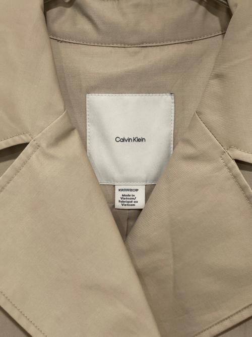 Calvin Klein（カルバンクライン）Calvin Klein (カルバンクライン) コットントレンチコート ベージュ サイズ:XS 未使用品の古着・服飾アイテム
